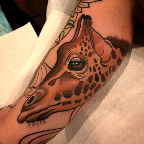 giraffe tattoo by dave wah at stay humble tattoo company in baltimore maryland the best tattoo shop in baltimore maryland