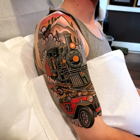car racing tattoo by dave wah at stay humble tattoo company in baltimore maryland the best tattoo shop and artist in baltimore maryland