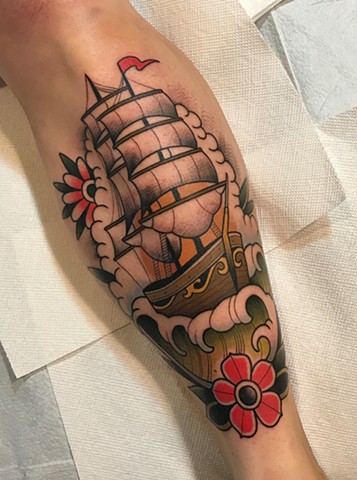 traditional ship tattoo by tattoo artist dave wah at stay humble tattoo company in baltimore maryland the best tattoo shop in baltimore maryland