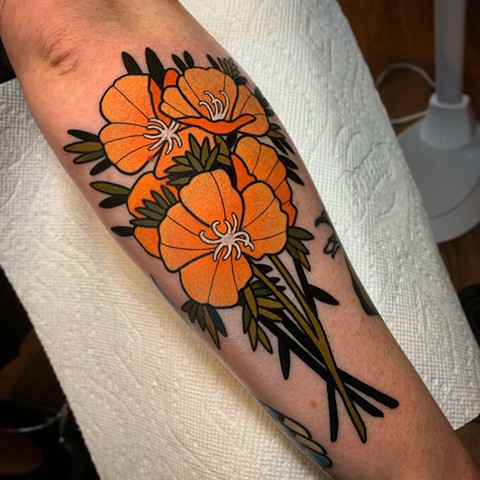 poppy flower tattoo by tattoo artist dave wah at stay humble tattoo company in baltimore maryland the best tattoo shop in baltimore marylandp