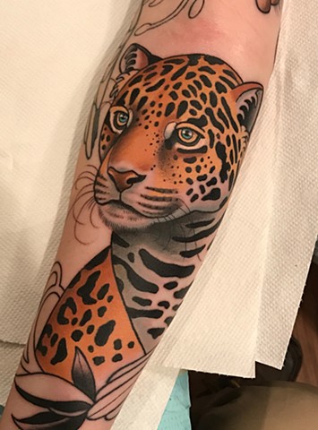 leopard tattoo by tattoo artist dave wah at stay humble tattoo company in baltimore maryland the best tattoo shop in baltimore maryland