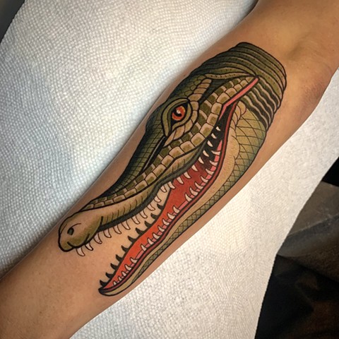 crocodile tattoo by tattoo artist dave wah at stay humble tattoo company in baltimore maryland the best tattoo shop in baltimore maryland