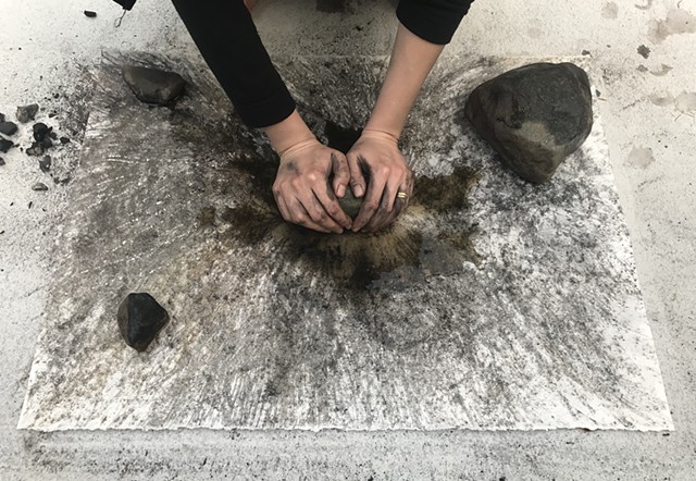 performative process from "Witness 2" 
April 2020 
performative drawing with rocks, tea, and charcoal