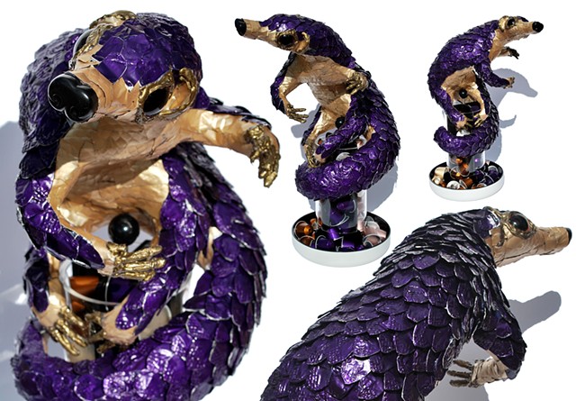 Pangolin sculpture upcycle recycle art sean e avery nespresso pods
