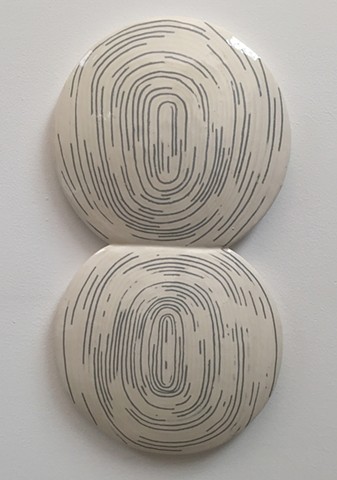 Ceramic construction with inlayed slip