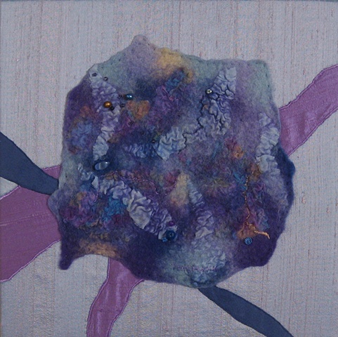 "Traversing the Microcosm" is a Nuno felted mixed media piece of contemporary fiber art by Linda Thiemann. 
