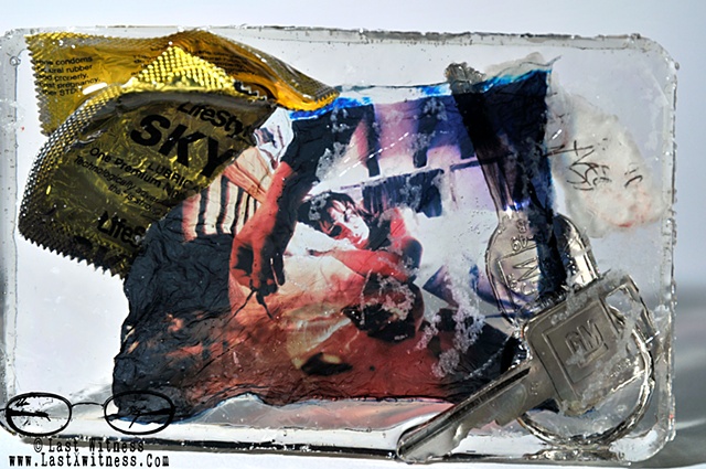 photo emulsion of "kathryn" from the testimony series suspended in resin with gm car keys and condom wrapper