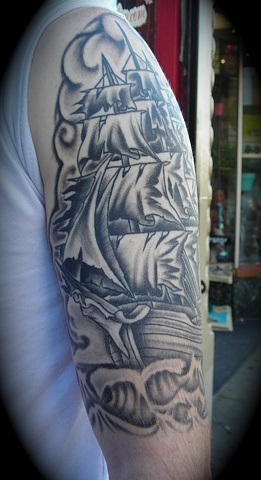 Black and Gray Ship on arm