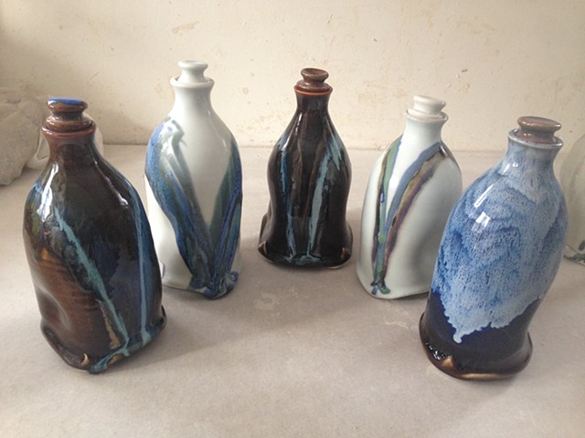 Thrown and altered gas fired pour jars