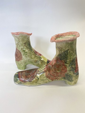 slip cast clay and onglaze with hand painted roses.