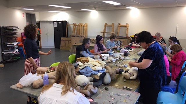 Craft group working on soft sculptures