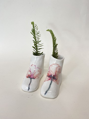 Porcelain shoes/vase with a painting of red poppies.