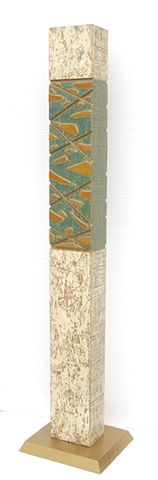 Dappled ivory and gold stele with band of green and gold glass with gold lines.  Beautiful seed distribution on the body of the stele, and beautiful glass and line work on the totem aspect.  On a painted gold wooden base.