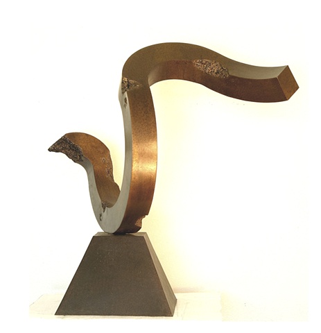 Pedestal bronze sculpture with dark golden brown patina that looks very different from every angle.  On bronze base.