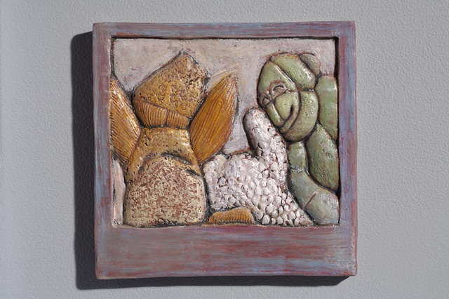 Hand cut tile, carved