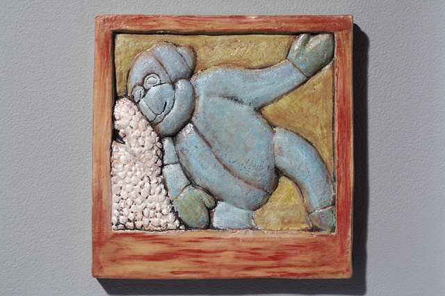 hand cut tile, carved, with encaustic 
