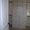 Antique White master bedroom cabinetry