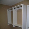 White melamine double hang cabinetry