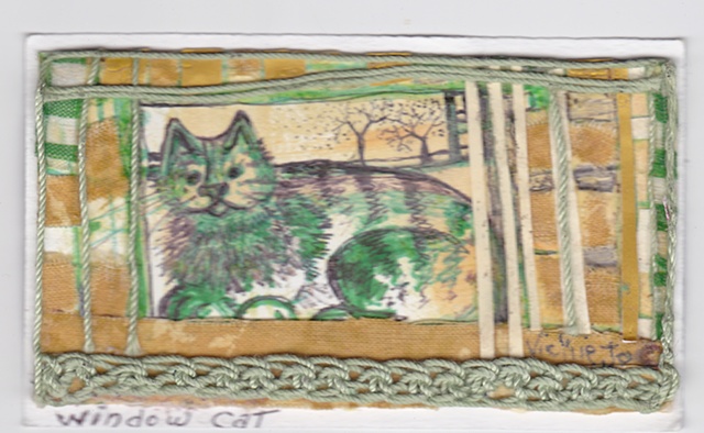 Green Cat Collage assembled with recycled materials.