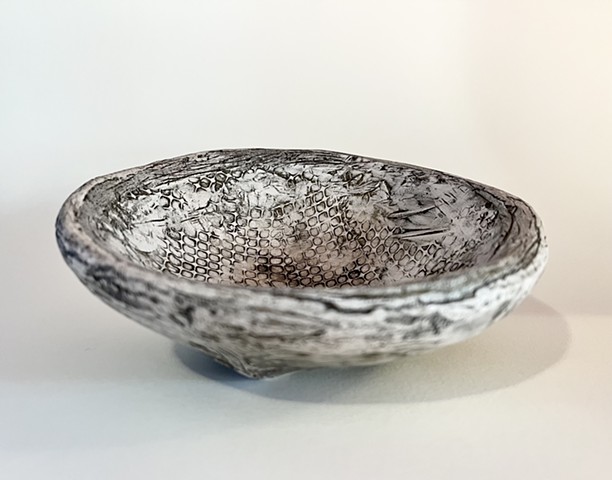 Plaster vessel, tipped bowl