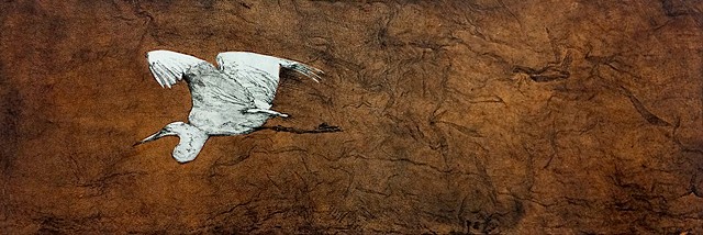 great egret flying through scrim