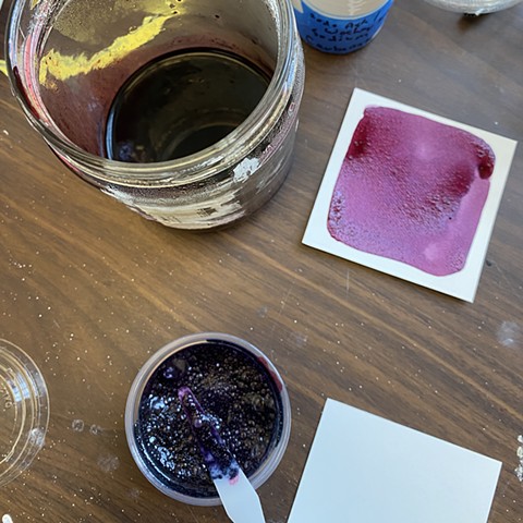 Divide the batch of ink, and to one batch, add a sprinkle of soda ash (washing soda) to shift the color. Mix well. It bubbles!
