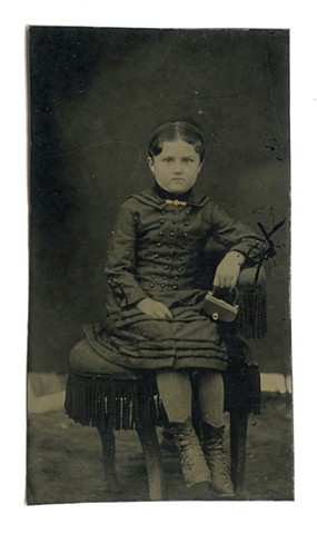 [young miss with gold brooch and black purse, in need of prunes]