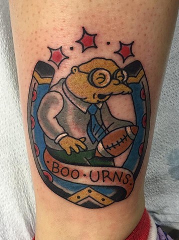 The Simpsons Moleman traditional colour tattoo style saying Boourns. Made in Vancouver 