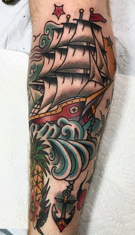 Traditional tall ship tattoo in a nautical style made in colour with anchor