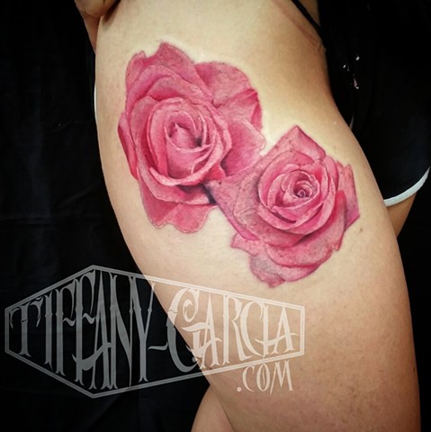 Pink realistic roses by female tattoo Artist Tiffany Garcia