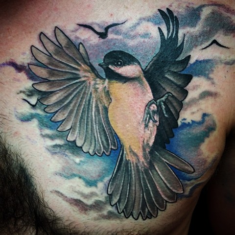 Chickadee bird by female tattoo artist Tiffany Garcia