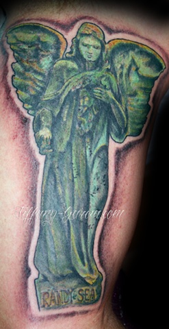 Stone Angel  by Tiffany Garcia Female Tattoo Artist located in Long Beach, Orange County, LA, Huntington Beach, Carson, Palos Verdes, Los Angeles, West Hollywood, Pacific Coast Highway and surrounding areas in Southern California.