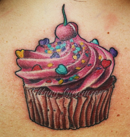 Colorful Cupcake  by Tiffany Garcia Female Tattoo Artist located in Long Beach, Orange County, LA, Huntington Beach, Carson, Palos Verdes, Los Angeles, West Hollywood, Pacific Coast Highway and surrounding areas in Southern California.