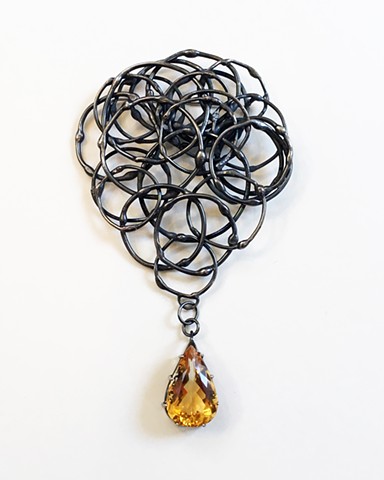 Anika Smulovitz, sterling silver jewelry brooch pin repurposed materials topaz gemstone