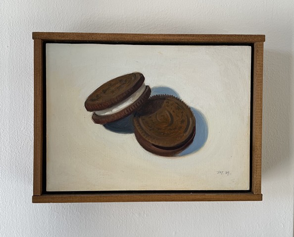 Still life two chocolate biscuits framed Oreo cookies