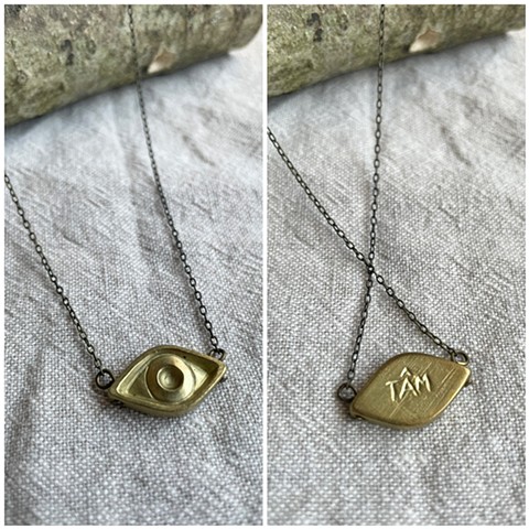 Brass eye pendant necklace