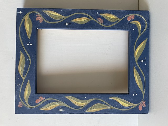 Hand painted frame with vines, flowers and stars
