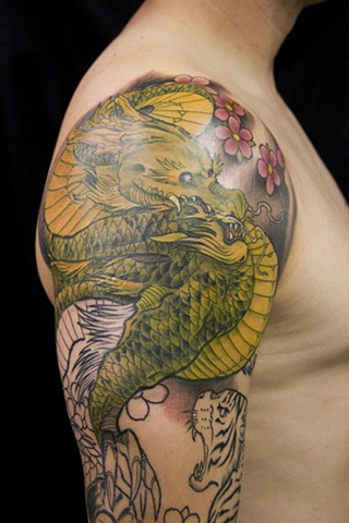 Dragon and Tiger coverup  in progress