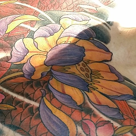 Koi lotus chest tattoo photo