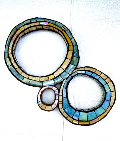 Kinetic sculptural abstract mosaic art. Stained glass mosaic. 