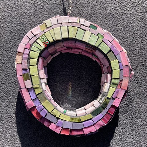 Kinetic sculptural mosaic made of smalti. A rainbOw of glass. Floating O. Crocenzi