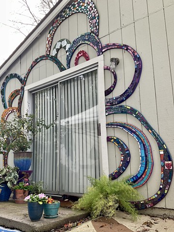 Easy installation of exterior mosaic mural arches. 