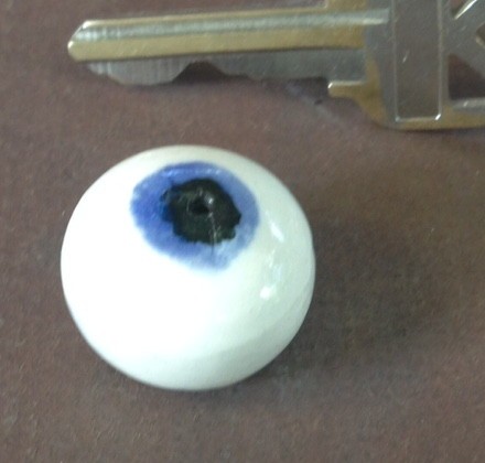 Tiny hollow eyeball pot
