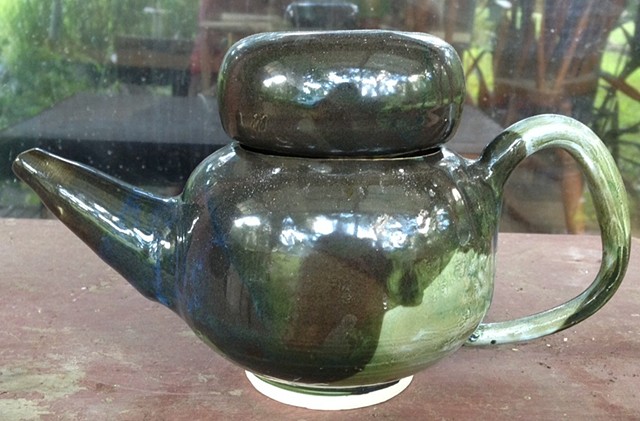 Dark green teapot
