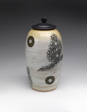 Midrange stoneware jar with decals, multiple glazes
