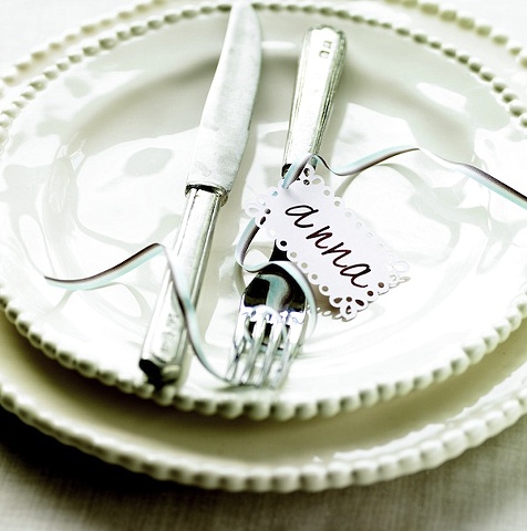 Southern Living 1001 Ways to Cook Southern fork and knife on white plate with ribbon and place card
