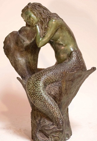 Bronze mermaid sculpture