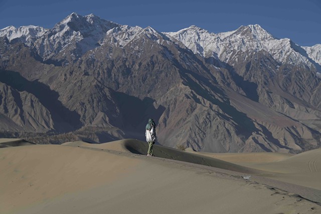 Walking in the Katpana desert in Skardu, Gilgit Baltistan, Pakistan.