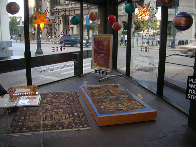 The installation in the window of the Chicago Visitors Center