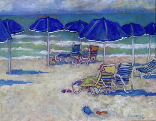 Day at the Beach with Blue Umbrellas